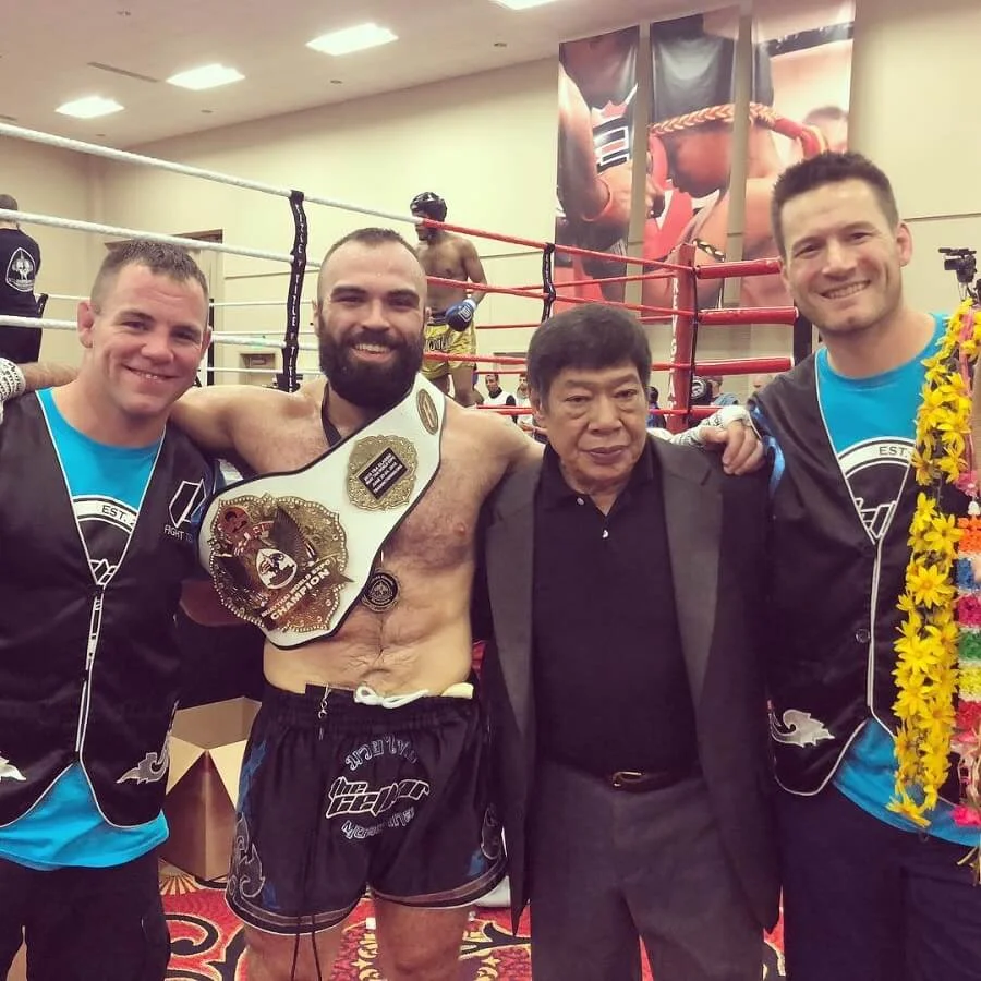 ben locken chris cichon and chai sirisute congratulate cj hays on championship